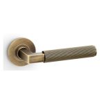 Alexander & Wilks AW202AB Hurricane Reeded Lever On Round Rose - Antique Brass (LEAD TIME: 2-3 DAYS)